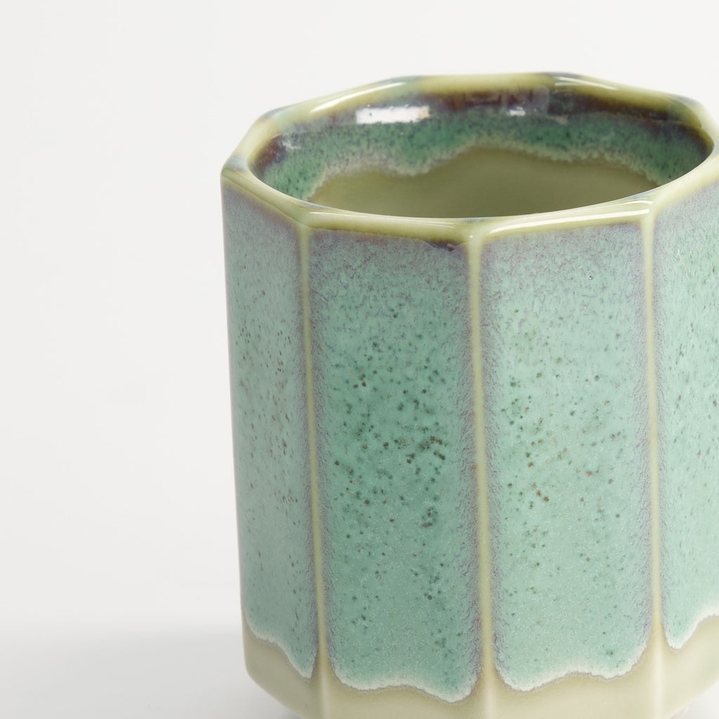 White and Aqua Glazed ceramic tea cup