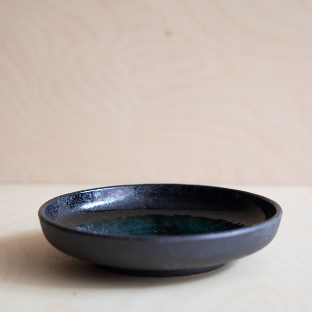 Black and jade green asian high rim plate exterior