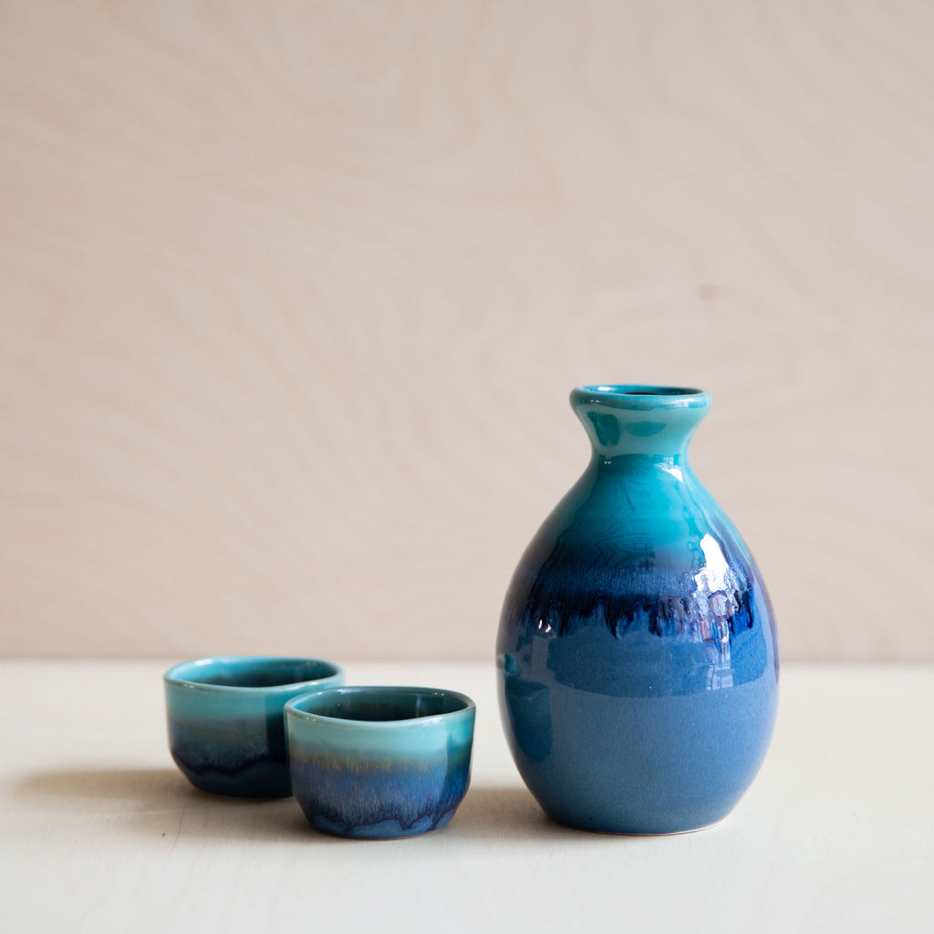 blue/turquoise drip ceramic sake jug and mug set, made in Japan