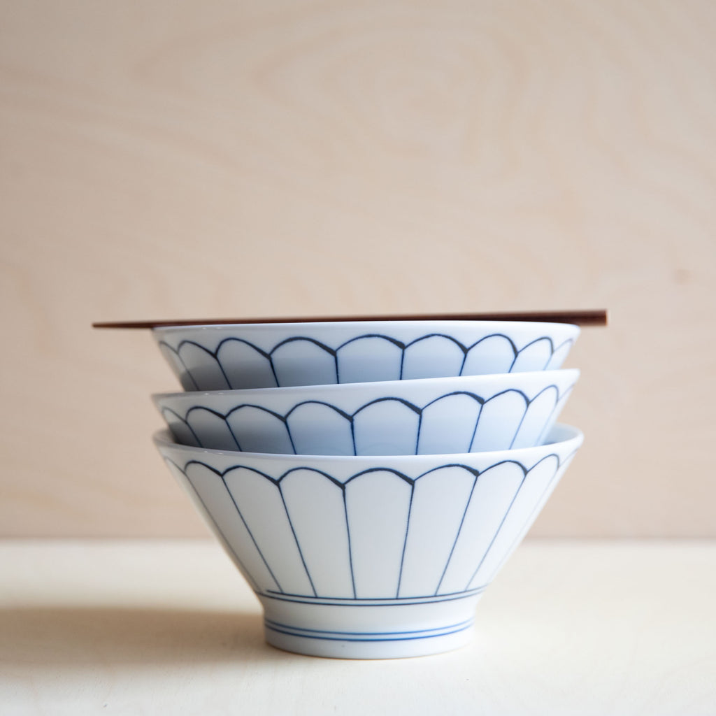 stack of 3 white lotus ramen bowls with chopstick