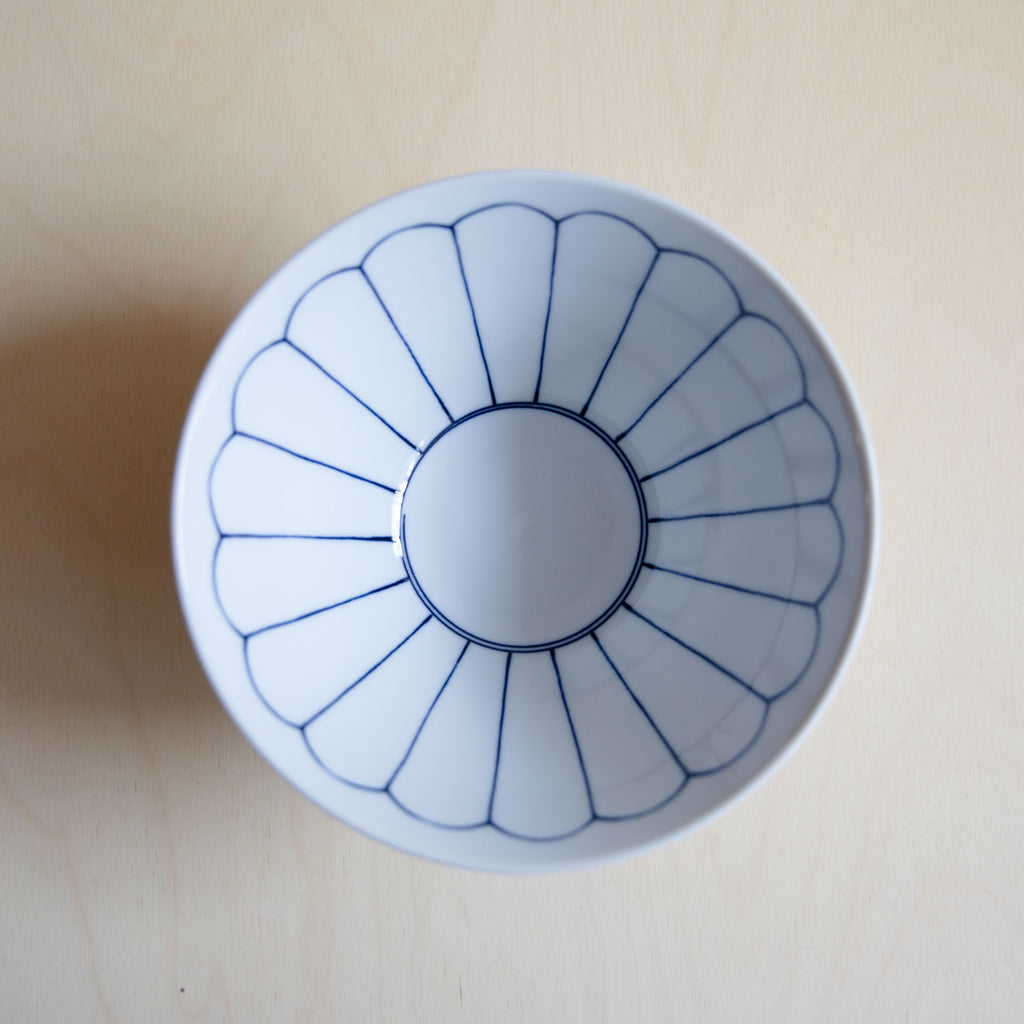 white lotus ramen bowl top view