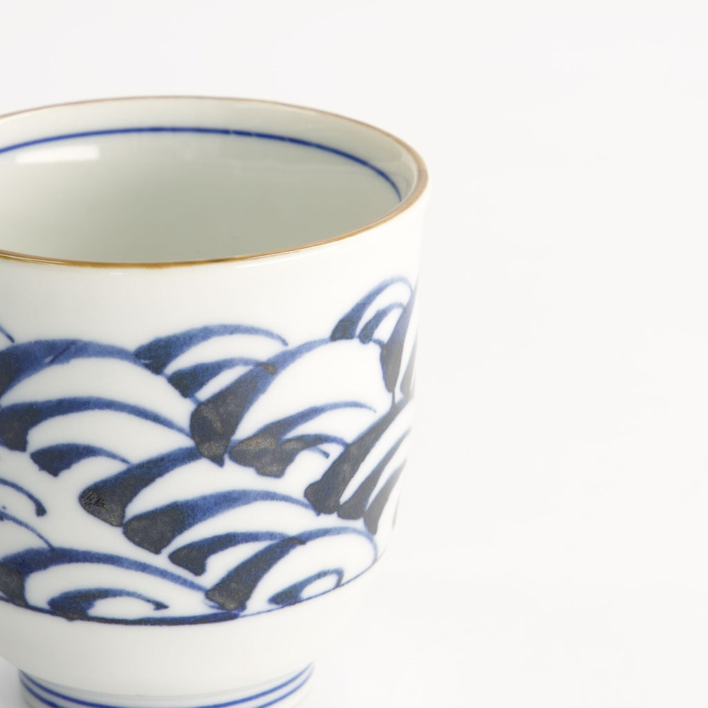 Hand painted blue wave tea cup