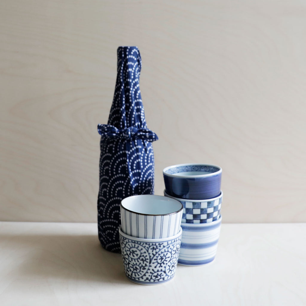 Stacked blue and white soba cups